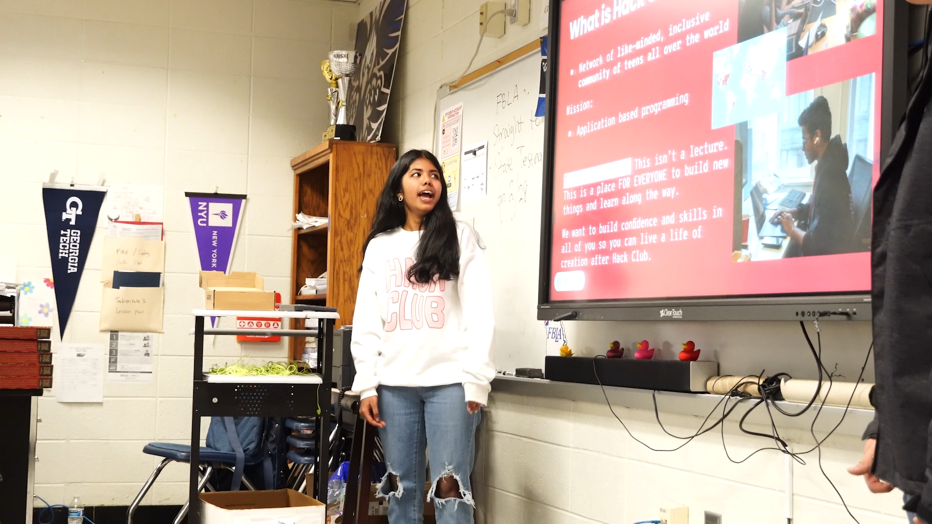 presenting hack club meeting on slides to the classroom